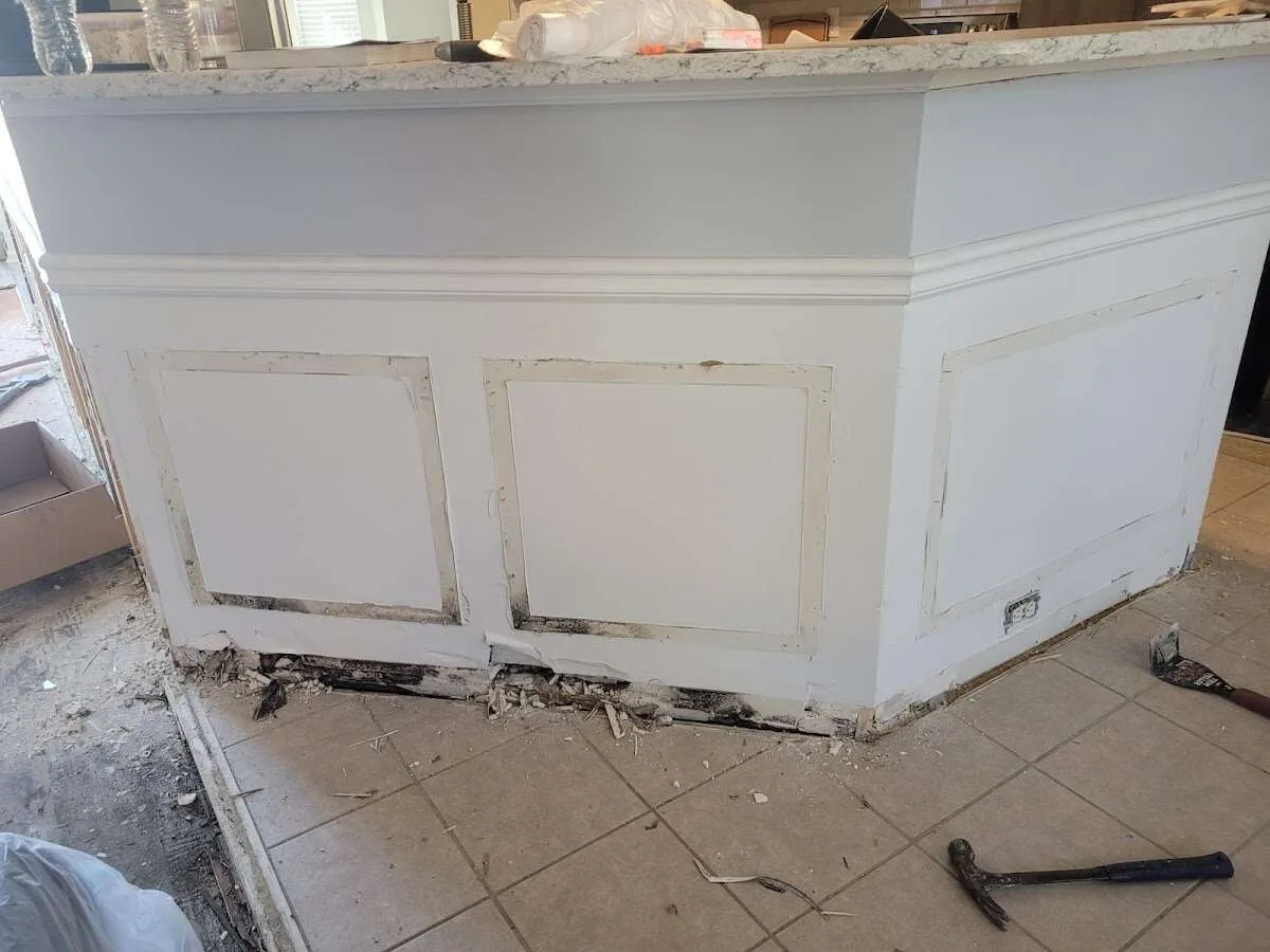 Water damage and mold on kitchen during Storm Damage Restoration in Bastrop